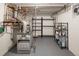 Functional utility room with organized storage, furnace and metal shelving at 521 N Fairfax St, Denver, CO 80220