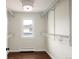 Well-organized walk-in closet with custom shelving offers ample storage space, combining functionality with style at 521 N Fairfax St, Denver, CO 80220
