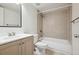 Bathroom with shower-tub combination and neutral tile backsplash at 384 S Ironton St # 413, Aurora, CO 80012