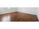 Bedroom with hardwood flooring and natural light from a window at 384 S Ironton St # 413, Aurora, CO 80012