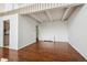 Living room with wood floors and an open floor plan at 384 S Ironton St # 413, Aurora, CO 80012