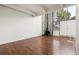 Bright living room with a stone accent wall, wood floors, a fireplace, and lots of natural light at 384 S Ironton St # 413, Aurora, CO 80012