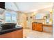 Bathroom featuring custom vanity, large mirrors, a glass shower and luxurious tub at 17635 Silver Fox Ct, Mead, CO 80542