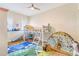 bedroom featuring bunk bed, slide, tent and natural light at 17635 Silver Fox Ct, Mead, CO 80542