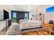 Comfortable bedroom with an accent wall and carpet at 17635 Silver Fox Ct, Mead, CO 80542