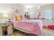 Bright bedroom with large window, decor and plush accents at 17635 Silver Fox Ct, Mead, CO 80542