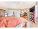 Comfortable bedroom with dresser, closet, and tv at 17635 Silver Fox Ct, Mead, CO 80542