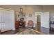 Inviting home office featuring a built-in desk, ample storage, and comfortable seating at 17635 Silver Fox Ct, Mead, CO 80542