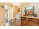 Functional laundry room with front load washer, dryer and nearby bathroom at 17635 Silver Fox Ct, Mead, CO 80542