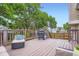 Spacious back deck with outdoor seating and grill, perfect for entertaining and relaxing at 11481 King St, Westminster, CO 80031