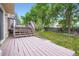Private backyard featuring a spacious deck, perfect for outdoor living and entertaining at 11481 King St, Westminster, CO 80031