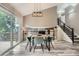 Bright dining room featuring hardwood floors, with backyard access at 11481 King St, Westminster, CO 80031