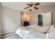 Spacious bedroom offering views of the en-suite bathroom and an additional closet at 11481 King St, Westminster, CO 80031