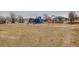 Community playground featuring slides, swings and climbing structures offers recreational fun at 11481 King St, Westminster, CO 80031