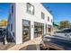 Commercial building with large windows, multiple entrances, and street parking at 4032 Upham St, Wheat Ridge, CO 80033