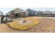 Landscaped backyard with gravel and firepit at 39 N Waterloo St, Aurora, CO 80018