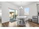 Bright dining area with sliding glass door leading to backyard at 39 N Waterloo St, Aurora, CO 80018