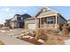 Two-story home with neutral exterior and landscaping. Features a two-car garage at 39 N Waterloo St, Aurora, CO 80018