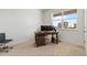 Home office with built-in desk and ample natural light at 39 N Waterloo St, Aurora, CO 80018