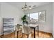 Bright dining room features modern lighting and stylish decor at 2280 W Center Ave, Denver, CO 80223