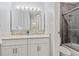 Bright bathroom showcasing a double sink vanity with white cabinetry and modern finishes at 3423 Madison Ave # X133, Boulder, CO 80303