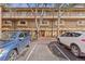 Exterior view of property showcasing covered balconies and convenient parking at 3423 Madison Ave # X133, Boulder, CO 80303