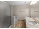 Spacious bathroom with double sinks, a tub-shower combo and a large mirror at 619 S Norfolk Way, Aurora, CO 80017