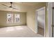 Bedroom featuring a ceiling fan, neutral walls and carpeted floor at 619 S Norfolk Way, Aurora, CO 80017