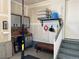 A well-organized garage is equipped for workouts, includes storage cabinets and overhead shelving at 16022 W 63Rd Ln # A, Arvada, CO 80403