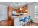 Modern kitchen features granite countertops, stainless steel appliances, and a breakfast bar at 16022 W 63Rd Ln # A, Arvada, CO 80403