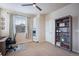 Home office with desk setup with bookcase storage at 16022 W 63Rd Ln # A, Arvada, CO 80403