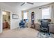 Home office with dual desks and a view of the bathroom at 16022 W 63Rd Ln # A, Arvada, CO 80403