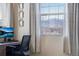 Home office with a desk setup and scenic views from the window at 16022 W 63Rd Ln # A, Arvada, CO 80403