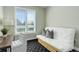 Bright bedroom with a daybed, workstation and large window offering scenic views at 2500 E Cherry Creek South Dr # 306, Denver, CO 80209