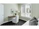 Cozy bedroom with daybed, desk and a light-filled interior showcasing modern design at 2500 E Cherry Creek South Dr # 306, Denver, CO 80209
