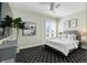 Comfortable bedroom with cozy carpeting, a large window and ample natural light at 2500 E Cherry Creek South Dr # 306, Denver, CO 80209