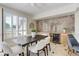 Elegant dining space with a wine cooler and stylish marble accents at 2500 E Cherry Creek South Dr # 306, Denver, CO 80209