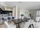 Open dining area with a view of the kitchen and living room at 2500 E Cherry Creek South Dr # 306, Denver, CO 80209