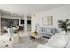 Open-concept living space with modern furnishings and a seamless flow at 2500 E Cherry Creek South Dr # 306, Denver, CO 80209