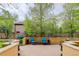 Charming outdoor patio with comfortable seating amidst lush greenery, perfect for relaxation at 2500 E Cherry Creek South Dr # 306, Denver, CO 80209