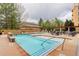 Inviting outdoor pool area with lounge chairs, ideal for relaxation and recreation at 2500 E Cherry Creek South Dr # 306, Denver, CO 80209