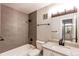 Bathroom with tiled shower and modern fixtures at 2479 S Xanadu Way # C, Aurora, CO 80014