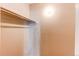 A closet with clothes rack and plain walls provides storage space at 2479 S Xanadu Way # C, Aurora, CO 80014