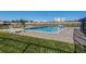 A refreshing community pool with ample seating and serene surroundings at 2479 S Xanadu Way # C, Aurora, CO 80014