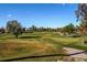 Scenic view of the green with red flag on the golf course at 2479 S Xanadu Way # C, Aurora, CO 80014