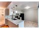 Bright eat-in kitchen featuring white cabinets, granite countertops and stainless steel appliances at 2479 S Xanadu Way # C, Aurora, CO 80014
