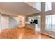 Bright living room with wood floors, neutral walls and direct access to the kitchen at 2479 S Xanadu Way # C, Aurora, CO 80014