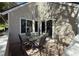 Patio with seating, table, and sliding glass door entry to home at 2479 S Xanadu Way # C, Aurora, CO 80014