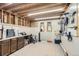 Unfinished basement space with lots of storage and a workbench at 1720 Chaparro Cir, Berthoud, CO 80513