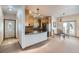 Open kitchen and dining area with granite countertops and stainless steel appliances at 1720 Chaparro Cir, Berthoud, CO 80513